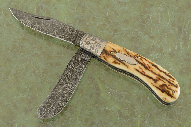 Feather Damascus Two Blade Saddlehorn Trapper with Mammoth Ivory